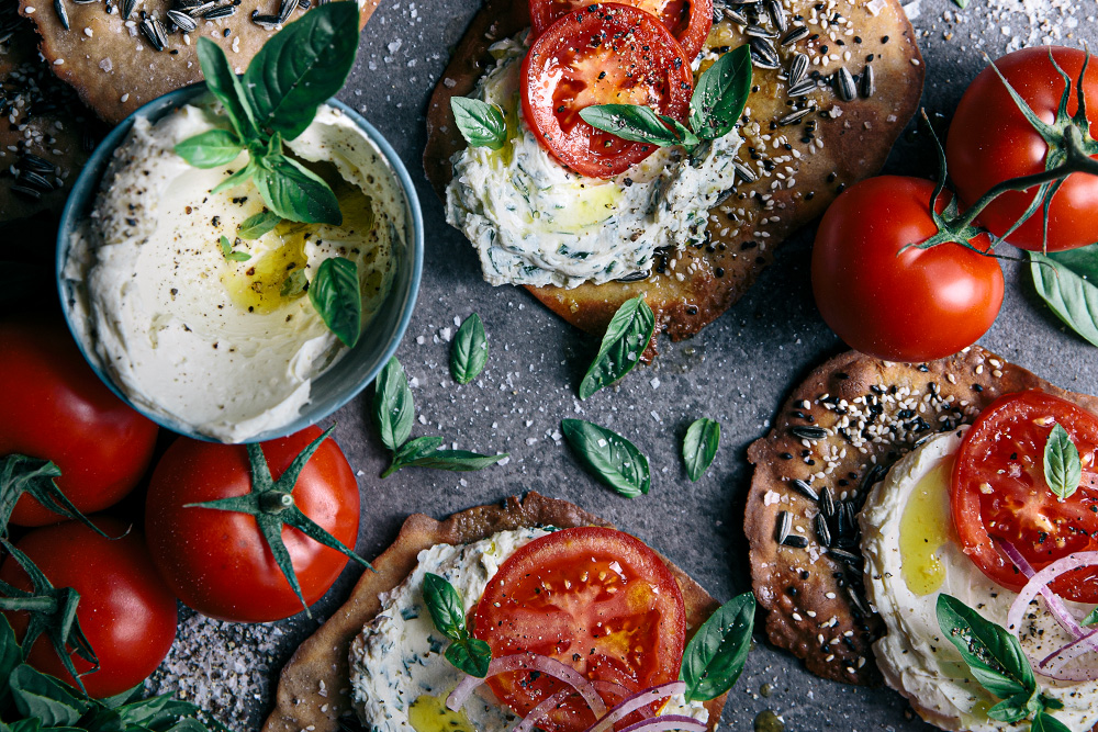 Seedy Buckwheat Flatbreads with Herby Philly Cream Cheese & Fresh Tomato  |  Gather & Feast